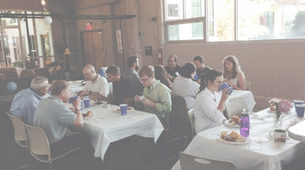 ProviderTrust team eating at tables