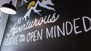 photo of a mural that says be adventurous